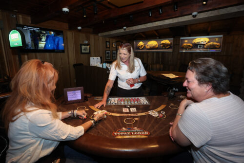 Dealer Kim Hill works at the Topaz Lodge, in Gardnerville, Nev., on Wednesday, July 26, 2023. Photo by Cathleen Allison/Nevada Momentum Fueled by RAD